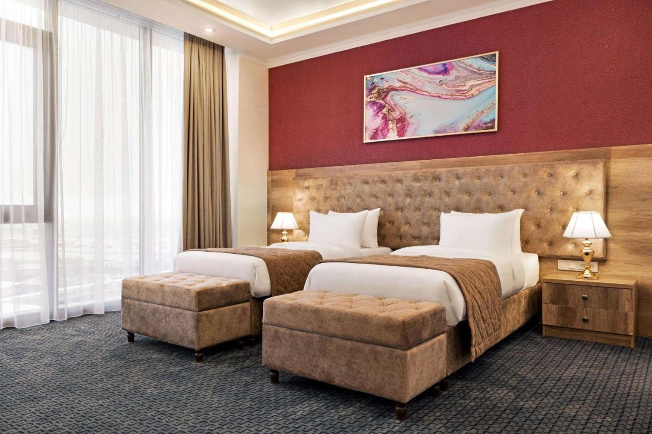 Ramada By Wyndham Shymkent Hotel Екстериор снимка